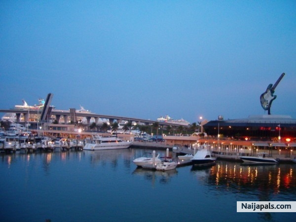 view at the port of Miami ..in the back ground the love boats sea cruisers..from Bayside Walk - click for next photo