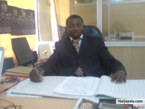 in office - click for next photo