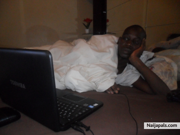 in bed surfing the net - click for next photo