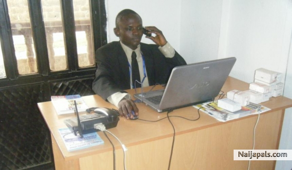 Adeniyi inside the office - click for next photo