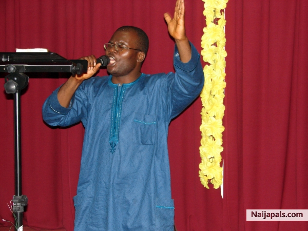 Pastor Ben ministering the word - click for next photo