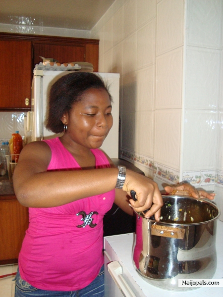 cooking in kictchen - click for next photo