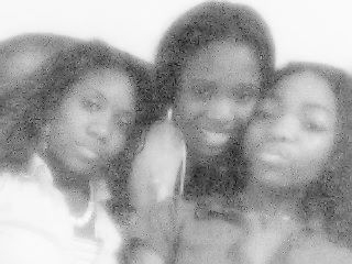 me (in da middle) and my sisters - click for next photo