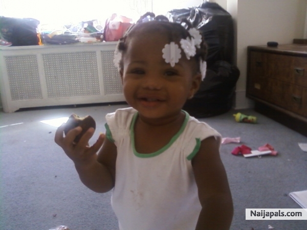 my great niece playing she needs to pick her toys up lol - click for next photo