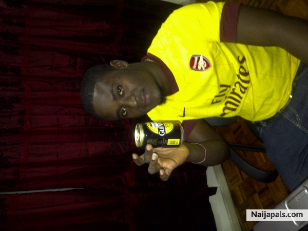looking good black man with black guinness - click for next photo