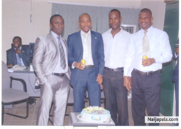 edoe with unity bank staff - click for next photo