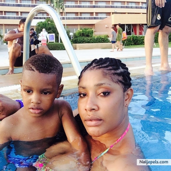 Actress Angela Okorie and her son - click for next photo