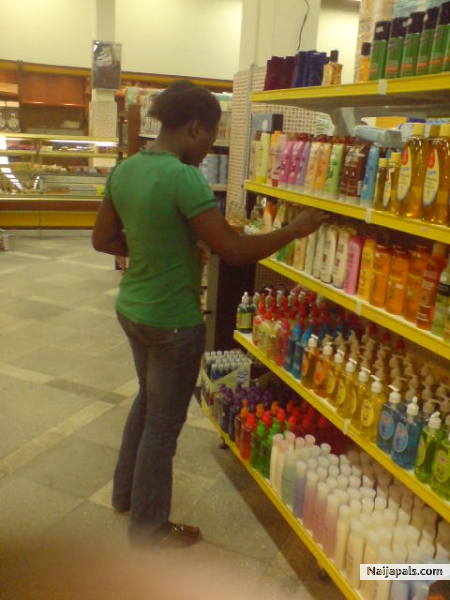 Girls and cosmetics, i wonder what she would do with all those soaps and creams. She is a friend though. - click for next photo