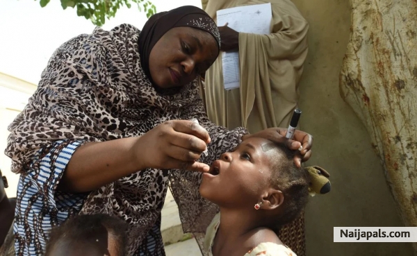 I do not know what they are doing to me but I trust they can take care! UNICEF is also around the corner! - click for next photo