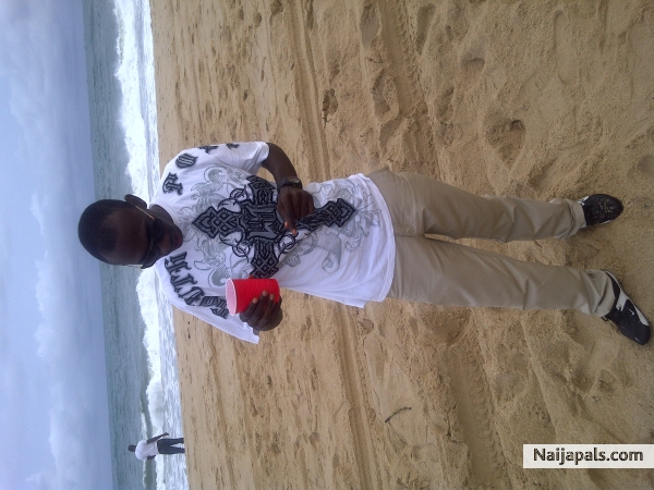 Relaxing in Afar Beach, Lekki. - click for next photo