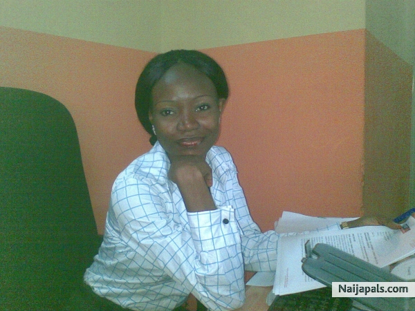 Smiling and working - click for next photo