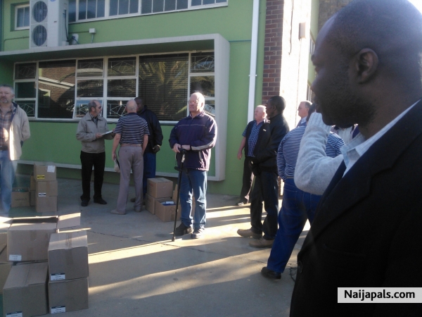 Distributing Bibles - click for next photo