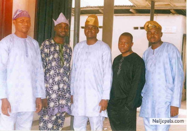 Akin in d midst of his friends @ a friend' s weddn. - click for next photo