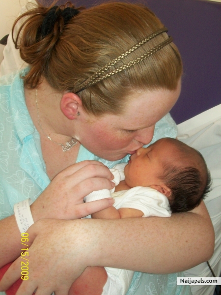 mother daughter kiss - click for next photo